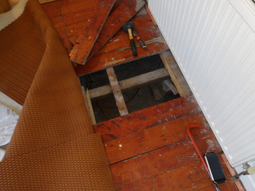 subfloor inspection during damp survey Liverpool